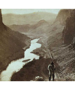Photo of A Native American watching the  completed transcontinental railroad - $12.38