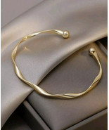 9KT GOLD PLATED BANGLE ADJUSTABLE TWIST BRACELET GIFT USA SELLER - $9.89