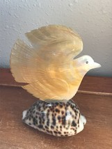 Carved Yellow &amp; Cream Seashell Peace Dove Bird w Rhinestone Eye on Brown... - $23.99