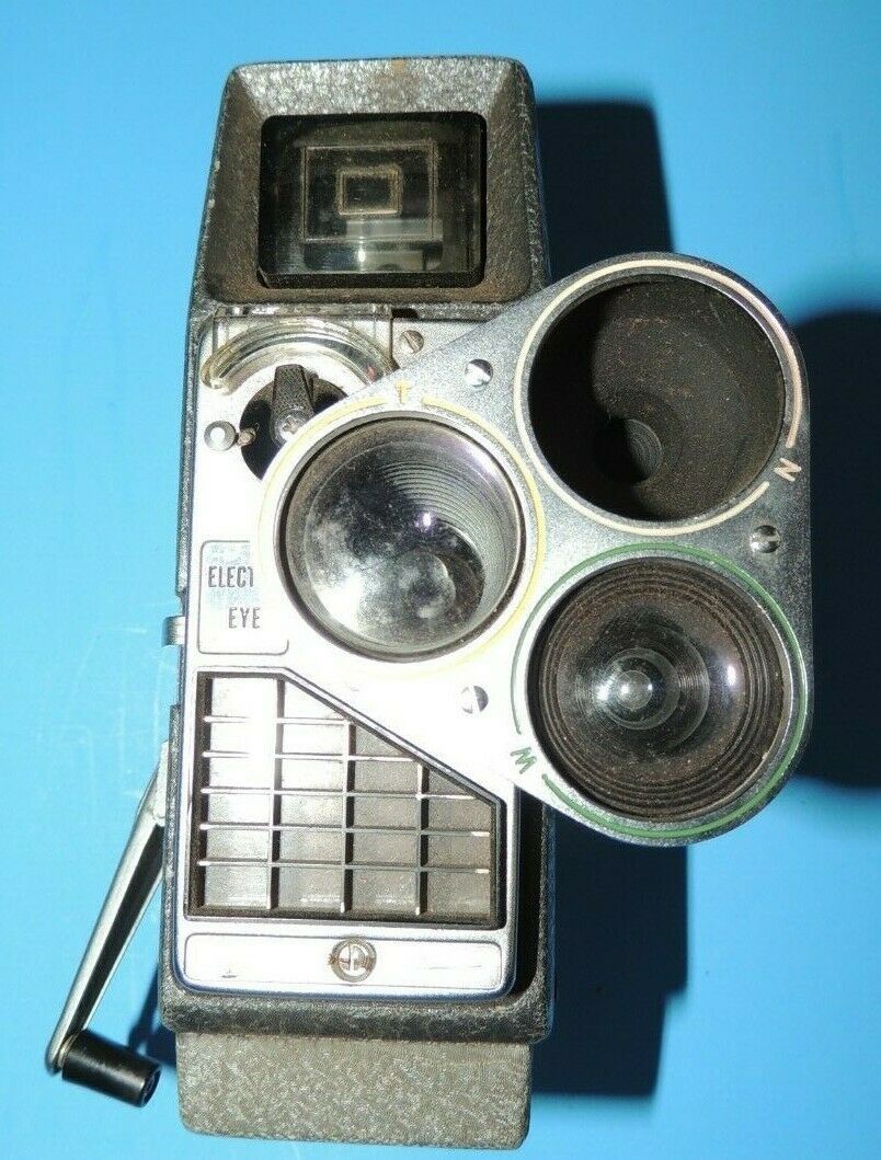 Primary image for Vintage 8MM MOVIE CAMERA BELL & HOWELL ELECTRIC EYE WITH TRIPPLE 3 LENS TURRET