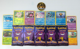 Lot of 9 cards, 5 trick or trade packs, holos, commons, reverses, pokemon coin - £12.77 GBP