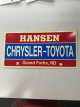 Vintage Plastic License Plate Insert Advertising Dealer HANSEN GRAND FOR... - $40.67 CAD