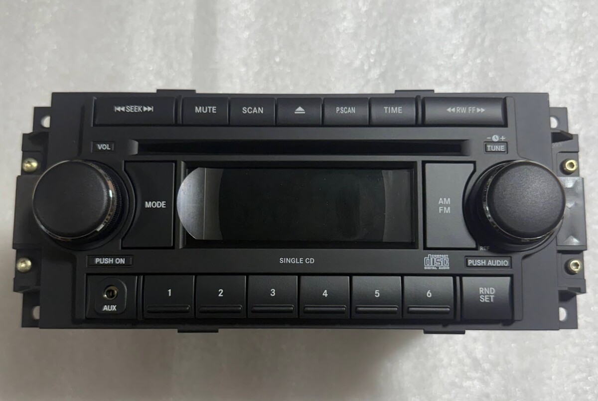 Chrysler Dodge Jeep OEM CD radio with aux jack. 2004-2008 REF stereo. NEW!! - $129.99
