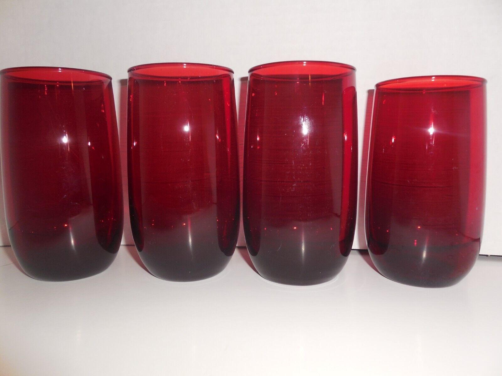 Primary image for Lot of 4 Anchor Hocking Royal Ruby Roly-Poly Tumblers  3 - 5", 1-4 1/2"