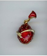 Russian Faberge Egg Pendant with a Red Enamelled finish and lines with g... - $29.72 CAD