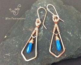 Handmade copper earrings: framed wire wrapped dangling blue glass dagger... - £22.67 GBP