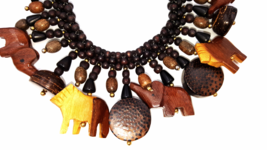 Vintage Hand Carved Wooden Animal Necklace  Safari Themed on a Braided Bead Rope - £34.45 GBP