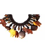 Vintage Hand Carved Wooden Animal Necklace  Safari Themed on a Braided B... - £34.62 GBP