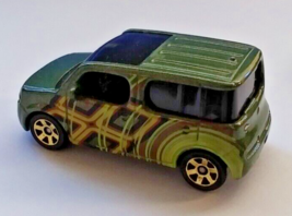 Matchbox 2010 Nissan Cube Die Cast Car, 1:62 Scale, Green with Gold Wheels. - $15.63