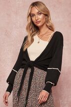 A Textured Knit Cardigan Sweater - $736.62 MXN