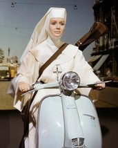 The Singing Nun Debbie Reynolds rides scooter 24x36 inch poster - $29.99