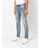 Neuw Stockholm Paint Splatter Iggy Skinny Cut Denim Jeans - $1,867.65 MXN