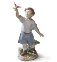 Lladro - Flying Free  - Size 25 x 13cm - $247.30