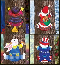 4-Pc. Set Seasonal Tree Crashers Santa Witch Bunny Uncle Sam Yard Decor - $183.60 MXN