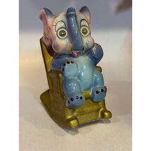 Vintage Ceramic Elephant Figurine Rocking Chair Coin Bank Lenticular Eyes - $35.21 CAD