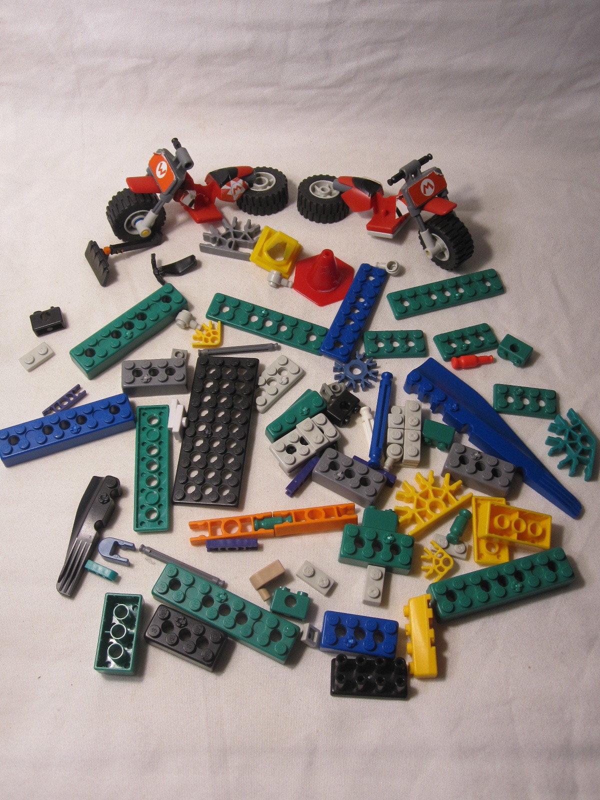 lot of vintage K'Nex building Blocks - Mario Bros Motorcycles + blocks & bits - $20.00