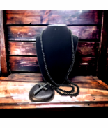 Black hematite cross long beaded necklace - $761.39 MXN