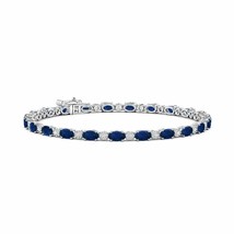 ANGARA 7.22 Ct Oval Sapphire Tennis Bracelet with Gypsy Diamonds in 14K Gold - $3,041.10