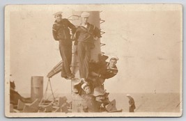 RPPC US Navy Sailors Posing In Damaged Ship Funnel / Chimney Postcard K23 - £14.97 GBP