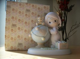 1991 Precious Moments “May Your World Be Trimmed With Joy” Figurine  - $60.00