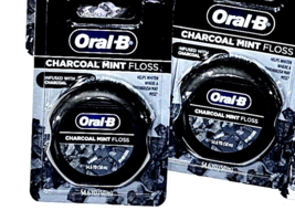 2 Packs Oral-B Charcoal Mint Floss Infused Helps Whiten 54.6yd - £15.00 GBP