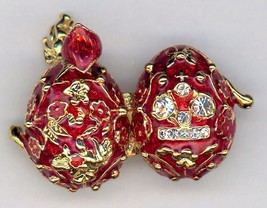 Russian Faux Pendant Red b/g w/golden wiggly designs, crystal face/angel/harp - $34.60