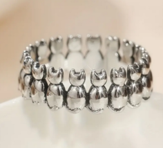 Row of cats silver band ring - $14.36
