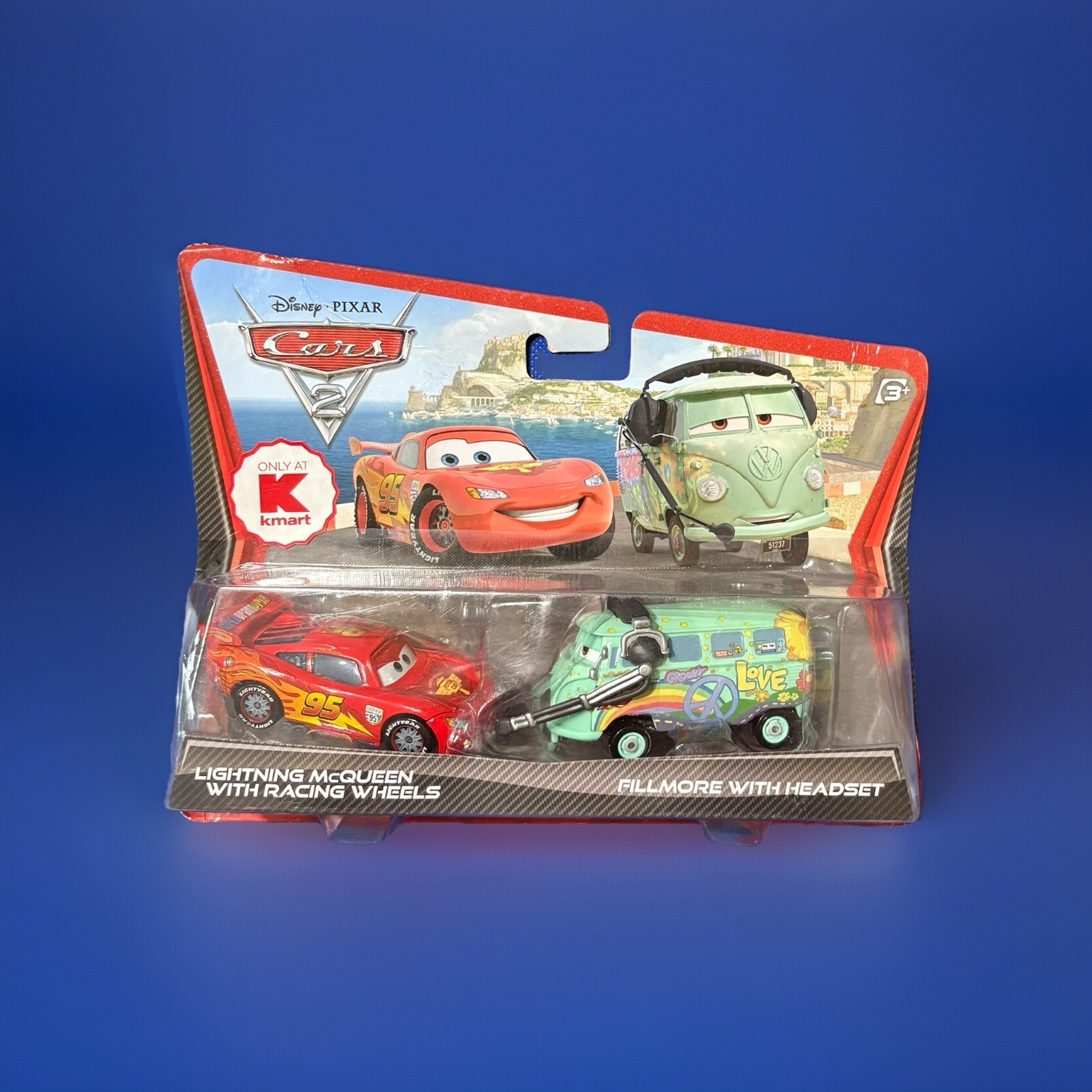 Disney Pixar Cars 2 Lightning McQueen w Racing Wheels &amp; Fillmore w Heads... - $26.55