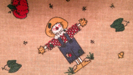 Fabric Marcus Bros Autumn Scarecrow Pumpkins and Yellow Acorns $1.25 - $22.96 MXN
