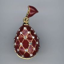 RED Silver Egg Pendant that Crystal cross-netting outside - $30.50