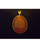 Goldtone Oval Shaped Orange Enhancer/Pendant - $18.00