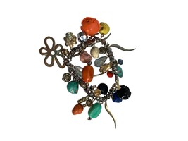 Unique Stretch Bracelet Skulls Flowers Charms Silver Tone Bold Colorful Beaded - £19.78 GBP