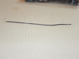 LIONEL PART -2312-009- GRAIN OF WHEAT BULB W/BLACK WIRE  - NEW- W79 - $1.13
