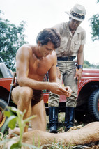 Ron Ely Tarzan Barechested Kneeling by Lion with Jeep in Background 24x1... - $23.99