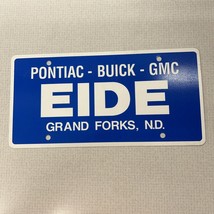 Vintage Plastic License Plate Insert Advertising Dealer EIDE GRAND FORKS... - $40.67 CAD