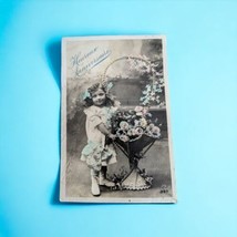 1911 French Happy Birthday Postcard  Girl with Wicker Basket of Flowers 2 Bows - £7.46 GBP