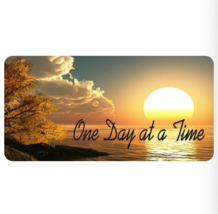 ONE DAY AT A TIME SUNSET LICENSE PLATE - $29.99