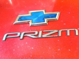 1998 2002 Chevrolet Chevy Geo Prizm emblem badge script OEM Genuine Original - £9.45 GBP