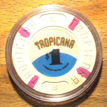 (1) $1. Tropicana CASINO CHIP - ATLANTIC CITY, New Jersey - Purple Inserts - $11.95