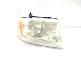 2005 Ford F150 OEM Right Headlight 4L3X-13005-A Hazy  - $50.49