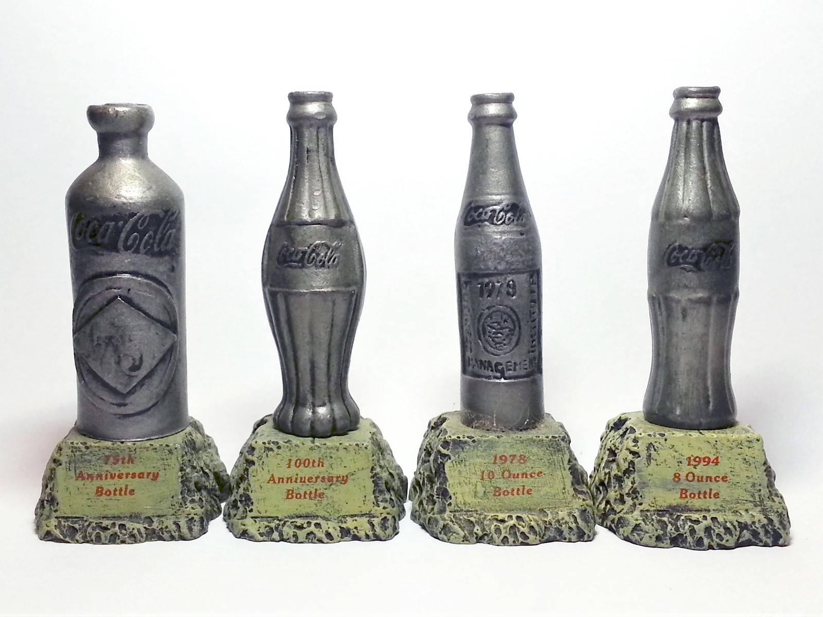 Primary image for Coca Cola 2000 Faux Aged Pewter Miniature Contour Bottle Statues Set of 4