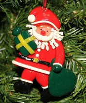 Kurt Adler Vintage 1990&#39;s Clay Dough Santa Claus Holding Gift Christmas Ornament - £5.49 GBP