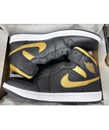 Authenticity Guarantee

Nike Air Jordan 1 Mid Shoes Black Metallic Gold ... - $135.81 CAD