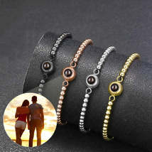 Circular Projection Couple Bracelet In 100 Languages - $22.19