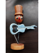 Vintage Wood/Metal  Salt Shaker / Bottle Opener  &quot;Guitar Player&quot; - $372.89 MXN