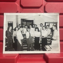 Group Of People Around Man Opening Briefcase 6 7/8 x 5 Photograph Vintage 1950s - $8.99