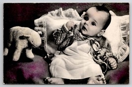 RPPC Adorable Baby Big Eyes with Stuffed Animal Toy Postcard I21 - £7.15 GBP