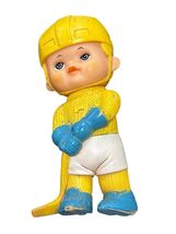 Vintage 1971 Yellow &amp; Blue Rubber Hockey Player Toy Figurine - $14.40