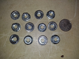 23BB82 ONE DOZEN 8MM NUTS WITH LOCKING FLANGES, NEW - £3.13 GBP
