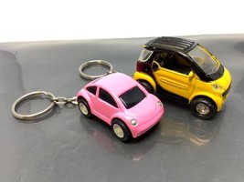 2 Vintage Souvenir Keyring Pink Car Keychain Yellow Car Ancien Porte-Clé Voiture - £9.43 GBP